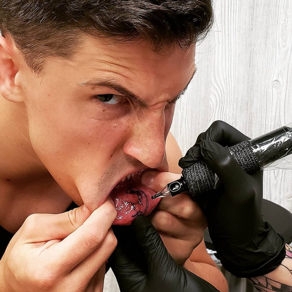 houston jones tongue tattoo